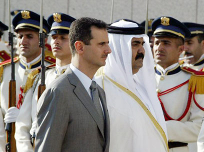 אמיר קטאר עם אסד. שינוי ביחסים             (צילום: AFP)
