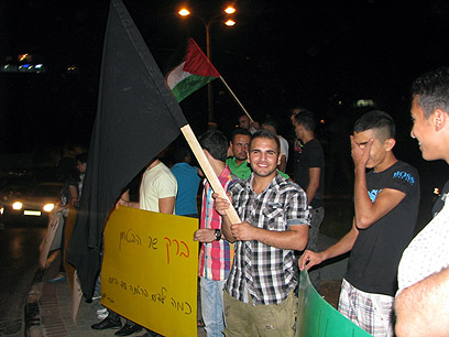 Protest against Ehud Barak. 'He's not wanted here' (Photo: Hassan Shaalan)