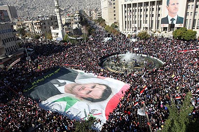 הפגנת תמיכה באסד השבוע בסוריה (צילום: EPA)