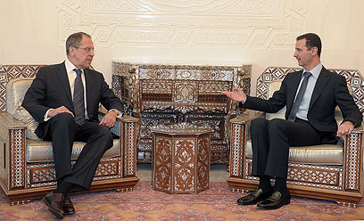 לברוב ואסד בדמשק. "פגישה טובה" (צילום: AFP)