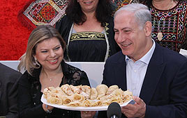PM Netanyahu and wife Sara at Mimouna celebration (Photo: Ido Erez)