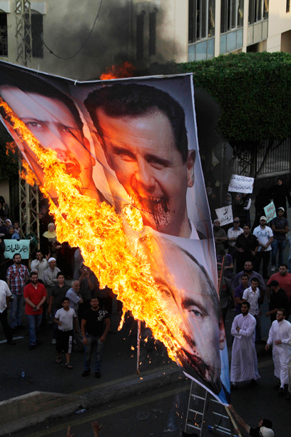 הפגנה בלבנון נגד אסד (צילום: AP)