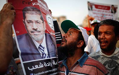 Celebrating Morsi's victory (Photo: Reuters)