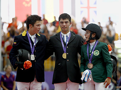 מדליית ארד באולימפיאדת הנוער. ומה בלונדון? מלחאס הסעודית (מימין) (צילום: EPA)