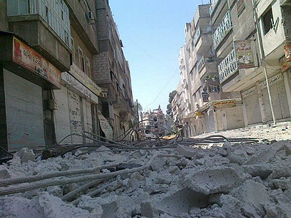 הריסות אחרי לחימה בפרבר של דמשק (צילום: רויטרס)