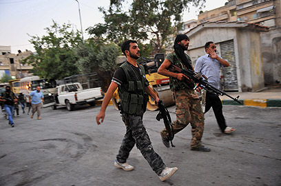 מורדים בעיר חלב, השבוע (צילום: AFP)