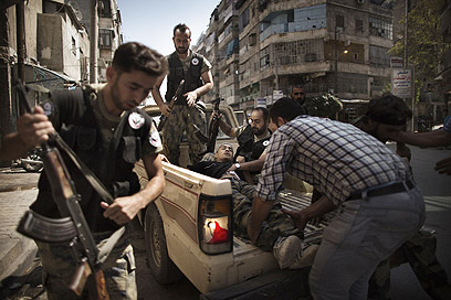 המורדים בסוריה. נלחמים גם באיראן וברוסיה? (צילום: AFP)