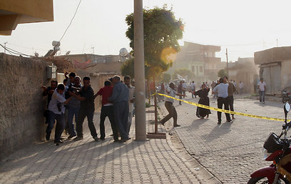חמישה אזרחים טורקים נהרגו מהירי הסורי (צילום: AFP)
