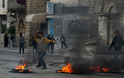 יום סוער בחברון  (צילום: AFP)
