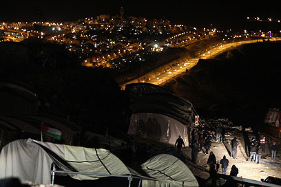 המאחז הפלסטיני ב-E1. "לפעול בדחיפות למנוע מהומות" (צילום: AFP)