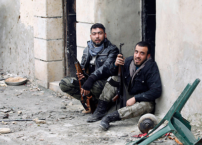 מורדים בסוריה. הלחימה נמשכת שנתיים (צילום: רויטרס)