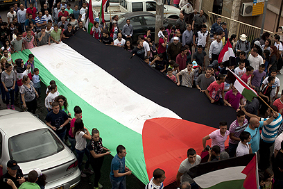 תהלוכת יום האדמה בסכנין (צילום: AFP)