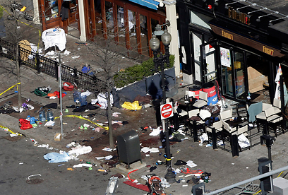 ההרס והדם אחרי הפיצוץ בבוסטון (צילום: AP)