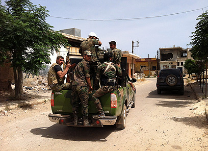 חיזבאללה במבוכה. לוחמים באל קוסייר  (צילום: AFP)