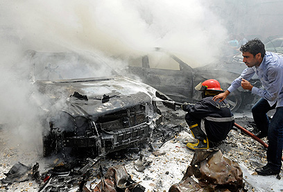 פיצוץ מכונית התופת בביירות אתמול. המורדים הסורים חשודים (צילום: EPA)