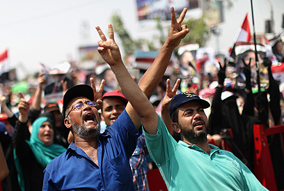 תומכי האחים בקהיר. הם לא מתכוונים לוותר (צילום: AFP)
