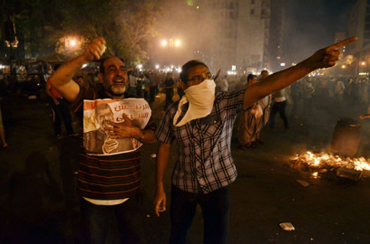 מבעירים את קהיר. אנשי "האחים המוסלמים" (צילום: AFP)