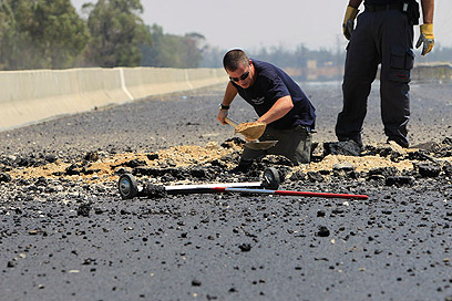 Qassam damage on Highway 35 (Photo: Tsafrir Abayov)