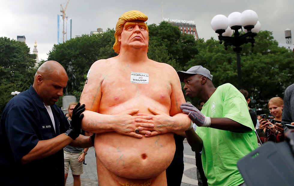 Naked Donald Trump statues pop up in cities across the US.